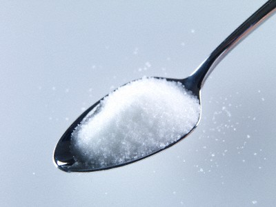 Spoonful of sugar --- Image by © Adrianna Williams/Corbis